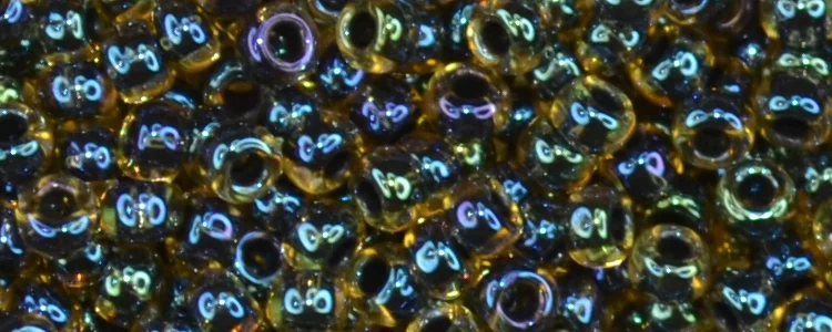 (image for) TOHO 8/o Round Seed Bead-Moss Green Lined Amber Transparent #8T244