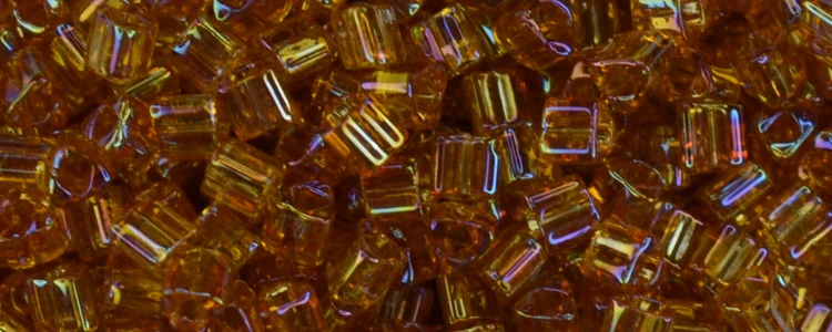 (image for) TOHO Size 11/o Triangle Shape Seed Bead-Dark Topaz Transparent Rainbow