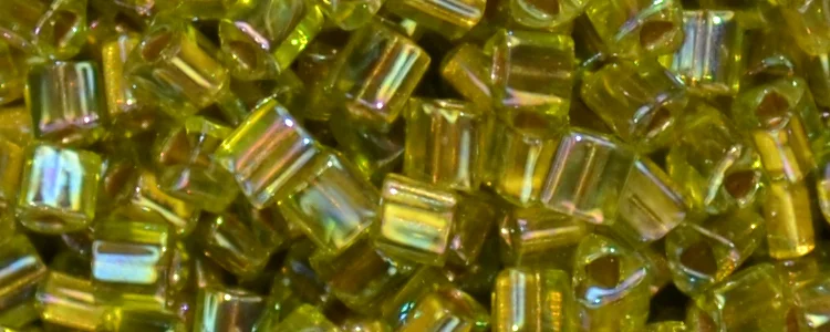 (image for) TOHO Size 11/o Triangle Shape Seed Bead-Bronze Lined Peridot Rainbow