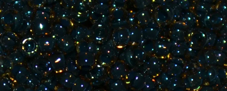 (image for) TOHO 15/o Round Seed Bead-Navy Lined Topaz Rainbow. 15T243