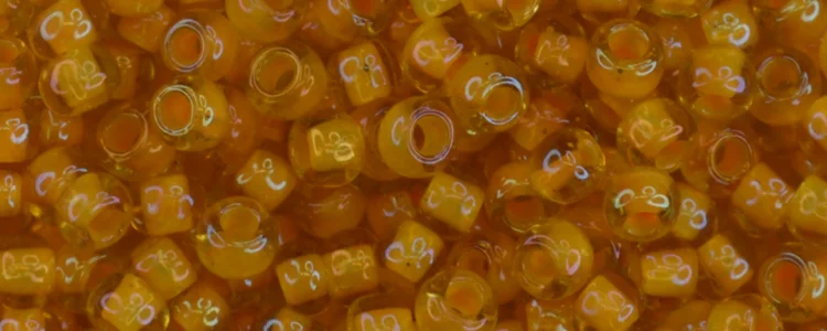 (image for) TOHO Size 6/o Round Seed Bead-Squash Lined Topaz Transparent 6T950