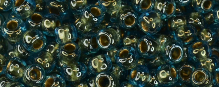 (image for) TOHO Size 6/o Round Seed Bead-Bronze Lined Aqua Transparent 6T990