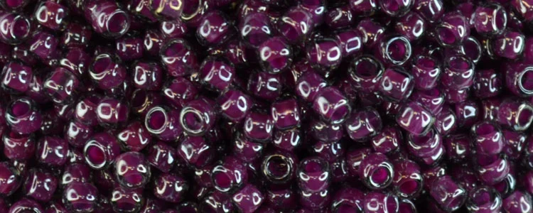 (image for) TOHO 8/o Round Seed Bead-Magenta Lined Black Diamond Transparent. 8T1076