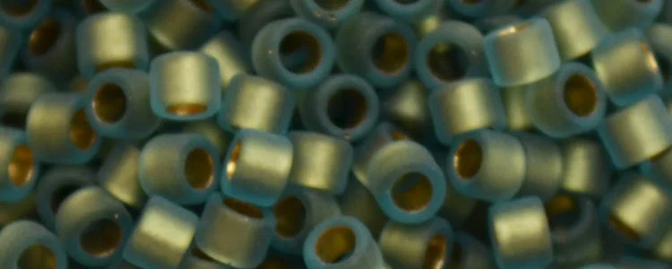 (image for) TOHO Aiko Precision Cylinder Bead. Bronze Lined Aqua Rainbow Matte TB-995FM