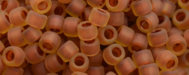 (image for) TOHO Aiko Precision Cylinder Bead. Light Brick Red Lined Topaz Matte TB-951FM