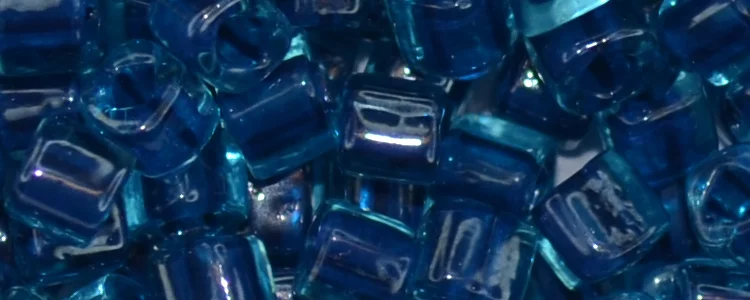 (image for) TOHO 4mm Cube Shape Seed Beads-Dark Blue Lined Aqua Transparent