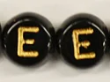 (image for) 6mm Black Glass Letter Bead - "E" - 100 Pack