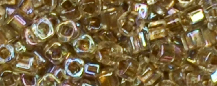 (image for) TOHO 3mm Cube Shape Seed Beads-Bronze Lined Crystal Rainbow