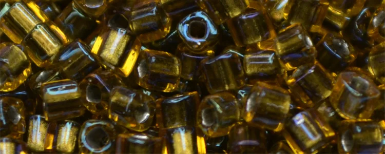 (image for) TOHO 2mm Cube Shape Seed Beads-Black Lined Light Topaz Rainbow
