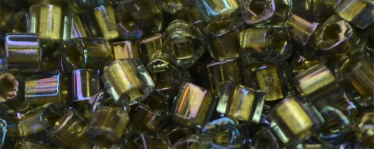 (image for) TOHO 2mm Cube Shape Seed Beads-Bronze Lined Montana Rainbow