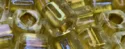 (image for) TOHO 4mm Cube Shape Seed Beads-Light Bronze Lined Crystal Rainbow