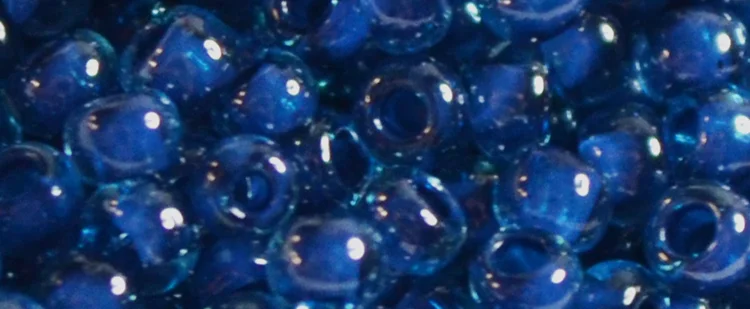 (image for) TOHO 15/o Round Seed Bead-Dark Blue Lined Aqua Transparent. 15T932