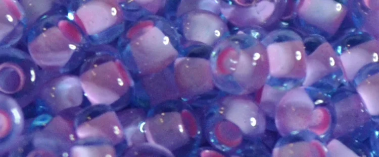 (image for) TOHO 15/o Round Seed Bead-Pink Lined Aqua Transparent. 15T937