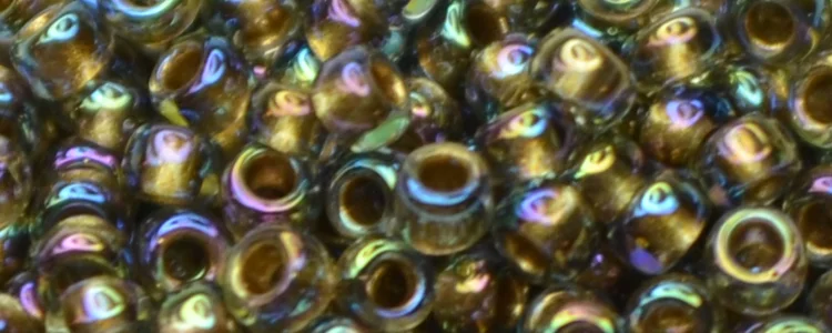(image for) TOHO 15/o Round Seed Bead-Bronze Lined Black Diamond Rainbow. 15T999