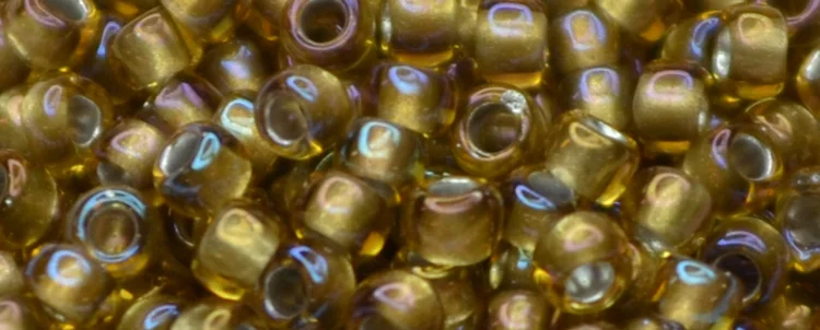 (image for) TOHO 15/o Round Seed Bead-Dark Bronze Lined Topaz Rainbow. 15T278