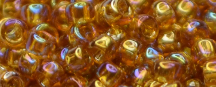 (image for) TOHO 15/o Round Seed Bead-Dark Topaz Transparent Rainbow. 15T162C