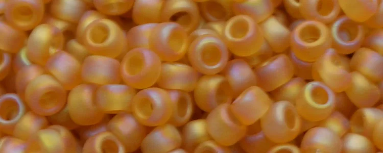 (image for) TOHO 15/o Round Seed Bead-Dark Topaz Transparent Rainbow Matte. 15T162CF