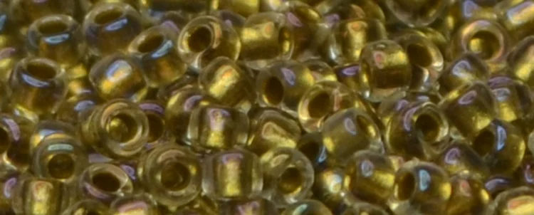 (image for) TOHO 15/o Round Seed Bead-Light Bronze Lined Crystal Rainbow. 15T262