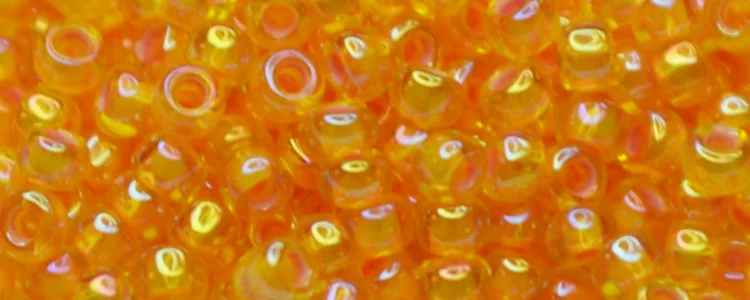 (image for) TOHO 15/o Round Seed Bead-Light Pink Lined Topaz Rainbow. 15T1827