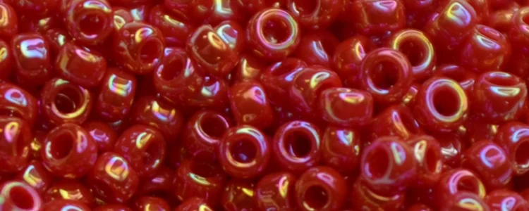 (image for) TOHO 15/o Round Seed Bead-Red Opaque Rainbow. 15T405