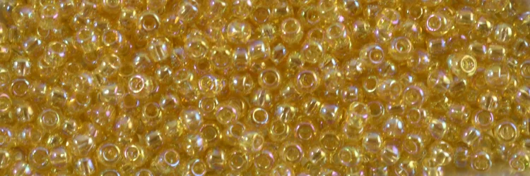 (image for) TOHO 11/o Round-Light Topaz Transparent Rainbow. 11T162