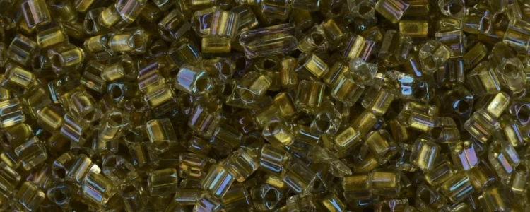 (image for) TOHO Size 11/o Triangle Shape Seed Bead-Light Bronze Lined Crystal Rainbow