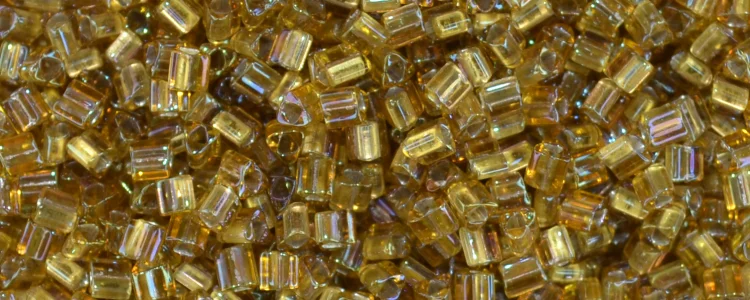(image for) TOHO Size 11/o Triangle Shape Seed Bead-Dark Bronze Lined Topaz Rainbow