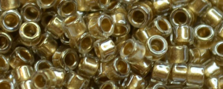 (image for) TOHO Aiko Precision Cylinder Bead. Bronze Lined Crystal Transparent TB-989