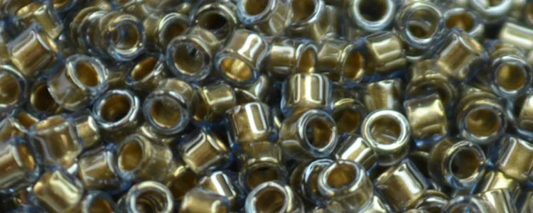 (image for) TOHO Aiko Precision Cylinder Bead. Bronze Lined Light Sapphire Transparent TB-992