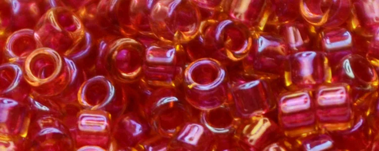 (image for) TOHO Aiko Precision Cylinder Bead. Dark Rose Lined Topaz TB-241
