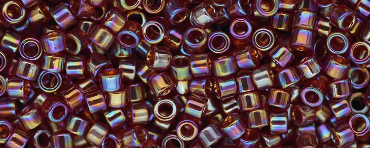 (image for) TOHO Aiko Precision Cylinder Bead. Garnet Transparent Rainbow TB-165D