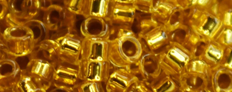 (image for) TOHO Aiko Precision Cylinder Bead. 24k Gold Lined Topaz Transparent TB-752