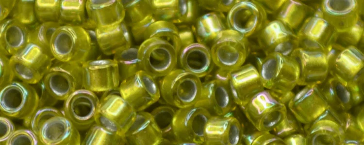 (image for) TOHO Aiko Precision Cylinder Bead. Lime Green Lined Peridot Rainbow TB-1811