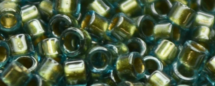 (image for) TOHO Aiko Precision Cylinder Bead. Metallic Green Lined Aqua TB-284