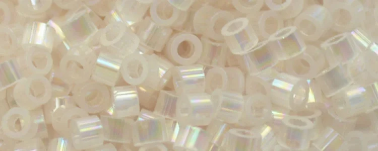 (image for) TOHO Aiko Precision Cylinder Bead. Very Light Pink Satin Rainbow TB-1553