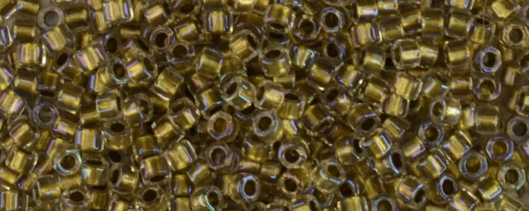(image for) TOHO Aiko Hexagon Precision Cylinder Bead. Light Bronze Lined Crystal Rainbow TBC-262