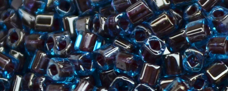(image for) TOHO 1.5mm Cube Shape Seed Beads-Dark Purple Lined Aqua Transparent