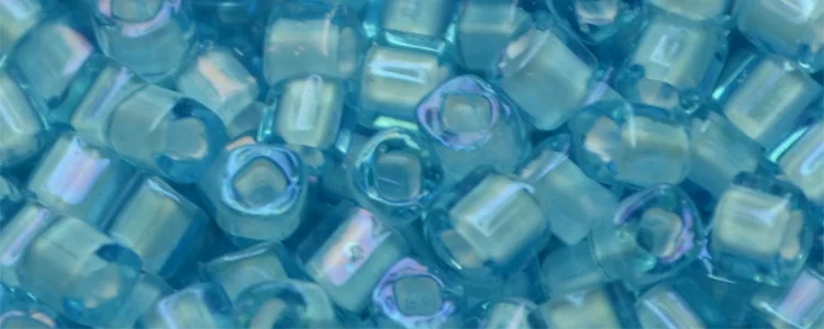(image for) TOHO 1.5mm Cube Shape Seed Beads-White Lined Light Aqua Transparent