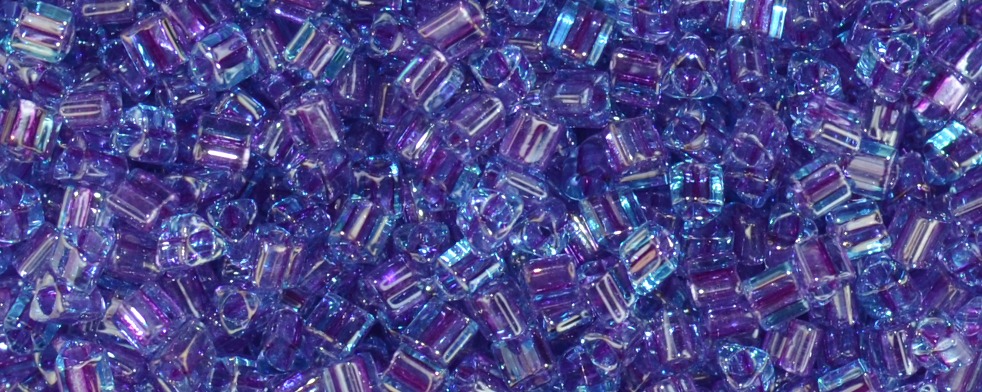 TOHO 11/o Triangle-Purple Lined Aqua