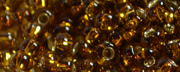 TOHO 11/o Round-Dark Golden Amber Silver Lined #11T2152S