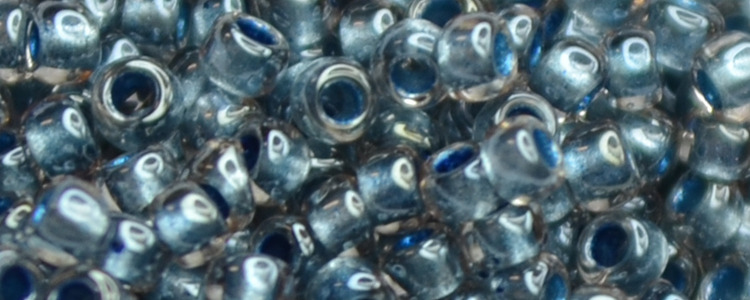 (image for) TOHO 15/o Round Seed Bead-Metallic Blue Lined Light Pink. 15T288