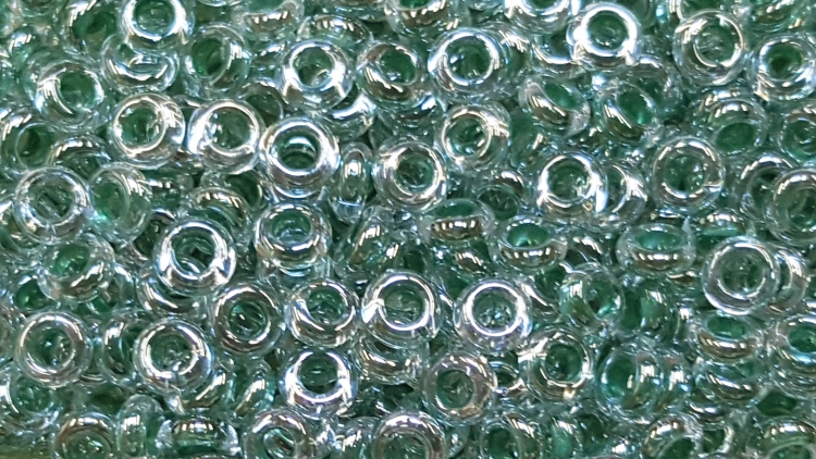 (image for) TOHO 11/o Round Seed Bead-Emerald Lined Crystal Luster. 11T1070-100