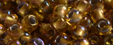 (image for) TOHO Size 11/o Round Seed Bead-Dark Bronze Lined Topaz Rainbow. 11T278-250
